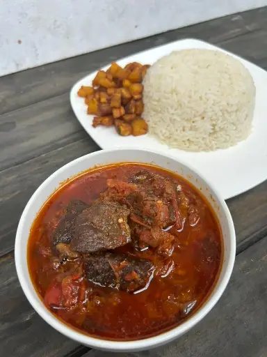 White Rice + Sauce + PLantain + Egg + Assorted